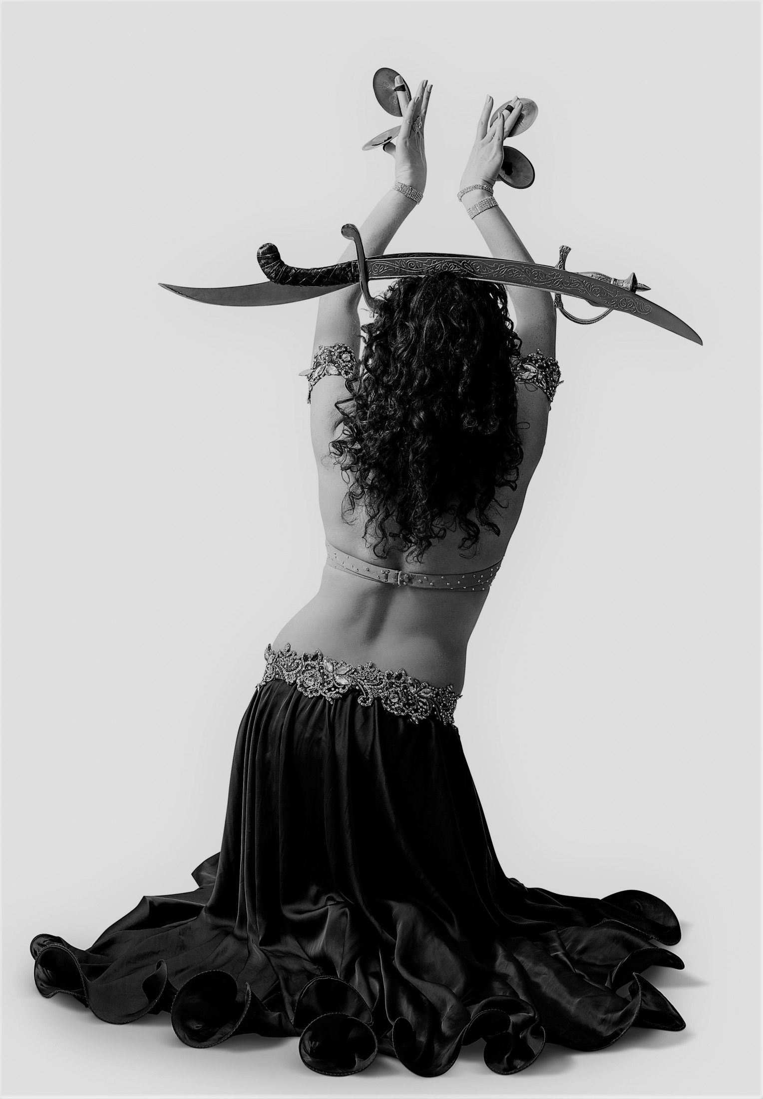 Finger cymbals for belly dance sword
